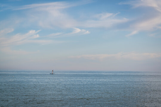 Person Doing Stand Up Paddle Boarding, Brighton, East Sussex, England, UK