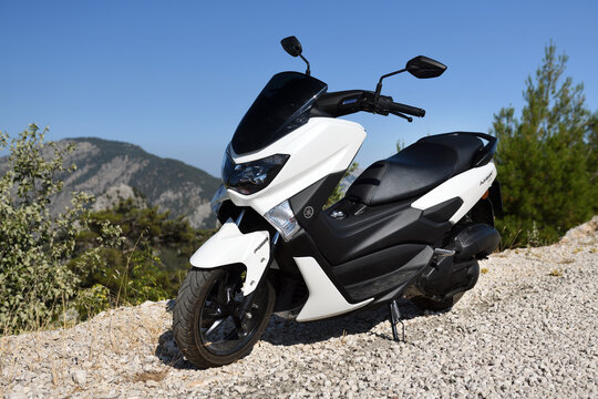 Turkey, Kemer 18.07.2021:Scooter white Yamaha NMAX 155 model 2020. The scooter is parked in the mountains of Turkey. 
