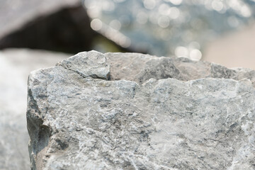 texture of stone near water (reflection)