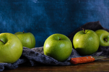 fresh green apples with assorted background