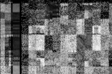 Naklejka na ściany i meble Pixel pattern of a digital glitch / Abstract black and white pixel pattern background of a digital glitch.