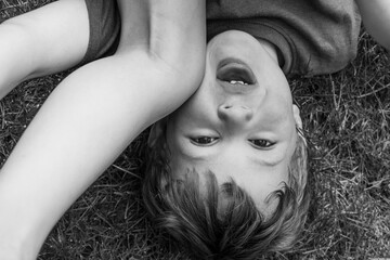 Black and white boy upside down