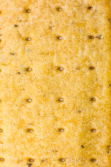 Roasted cookies texture background. Loaf Bakery concept. Close up, macro photo. Beautiful natural wallpaper.