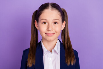 Photo of positive good mood school girl wear blue uniform smiling isolated purple color background