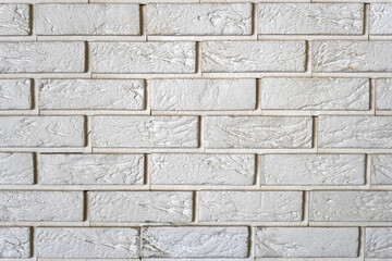 The texture is a  brick wall. light beautiful bricklaying. brickwork. abstract background