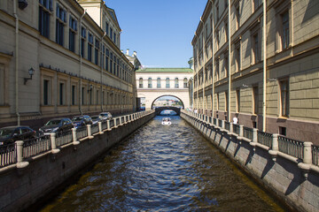 Fototapeta na wymiar Saint Petersburg, Russia-July, 16, 2021: a view of the water channel-a winter groove on a clear summer day and a space for copying