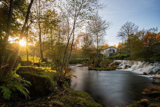 Mondim de Basto waterfall with a mill house at sunset, Norte, Portugal