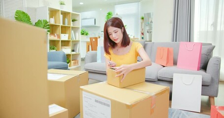 woman open delivery boxes