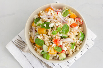Bulgur Wheat Salad with Vegetables in a Bowl Directly Above Close Up Photo
