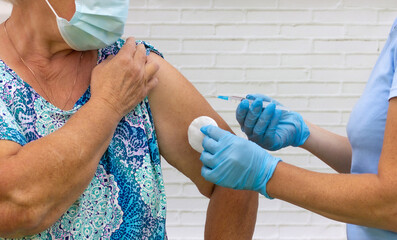 Vaccination of the elderly. Health concept.
