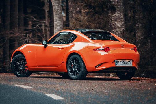 Mazda MX-5 ND RF 30th Anniversary edition Miata rear end shot, stop lights, wheel and exhaust details
