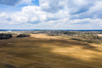 Aerial view of agricultural landscape with fields in spring season.