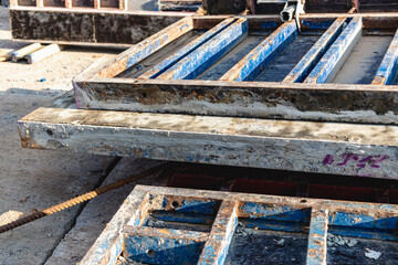 Industrial formwork for concrete foundations. Construction site. Construction equipment. Monolithic work with reinforced concrete.