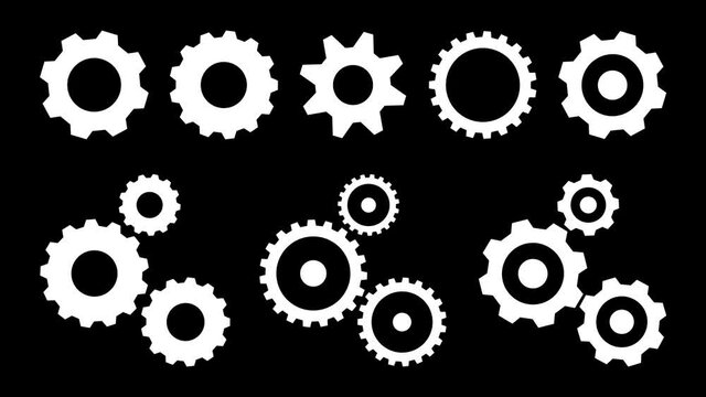 Gear setting rotation icons set. Isolated white gears mechanism and cog wheel on transparent background. Progress or construction concept. Cogwheel icons 4K video.