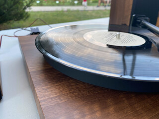 Fototapeta na wymiar Musical beautiful hipster turntable for old retro antique vinyl records