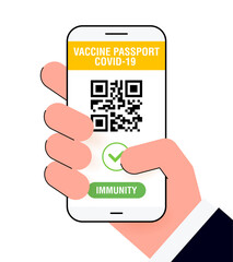 Covid-19 immune passport app. International Digital vaccine certificate for free movement and travel. Smartphone with Qr code test result in hand