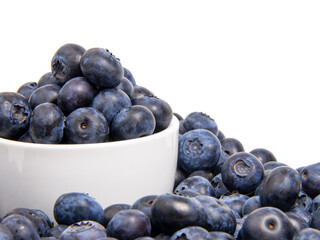 Fresh blueberry in white dish isolated on the white background