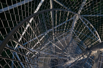 Metal ladder for climbing the tower