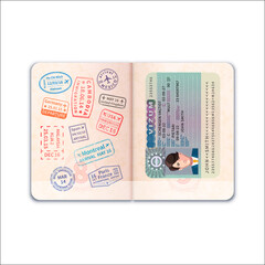 Open foreign passport with visa and immigration stamps on white