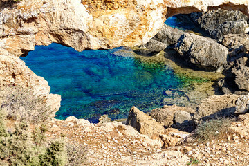 Natural stone arch Kamara Tou Koraka. Another name is Sinner Bridge. Cape Greco National Forest...