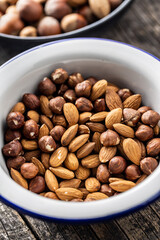 Peeled hazelnuts and almonds. Sweet nuts.