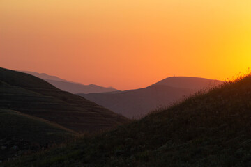 Fototapeta na wymiar Hills on sundown sky. High quality photo
