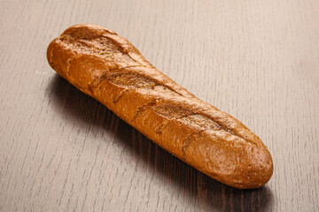 Crust tasty baguette over board