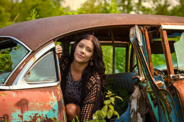 Woman in a vintage car