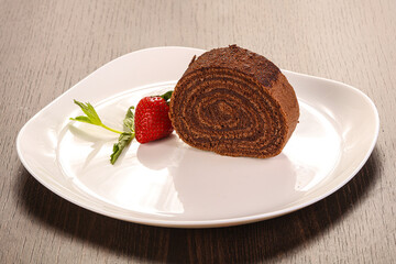 Chocolate roll cake served strawberry