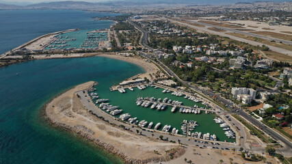 Obraz premium Aerial drone photo of 4th Marina of Glyfada a popular yacht anchorage with calm water beach next to it, Athens riviera, Attica, Greece