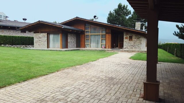 Contemporary wood and stone mountain vila house, establishment shot