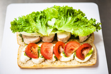 Street food festival, catering service. Salad with vagetables and meat 