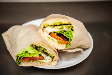 Fresh lettuce with meat and tomatoes for salad or sandwich. Street fast food