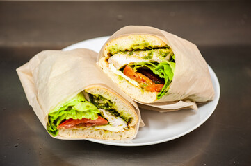 Fresh lettuce with meat and tomatoes for salad or sandwich. Street fast food