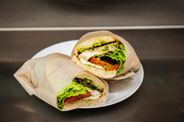 Fresh lettuce with meat and tomatoes for salad or sandwich. Street fast food