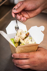 Take away food, noodle box.