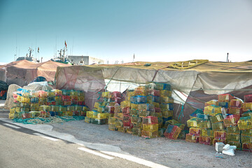Obraz premium Marbella, Malaga July 16, 2021, Traps for catching octopuses on fishing boats in the fishing port of Marbella, Marina La Bajadilla