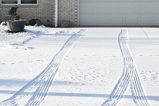 Tire Tracks in Driveway Snow