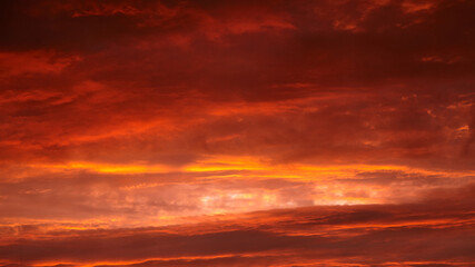 Red sunset sky with dramatic clouds