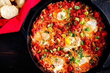 Turkish Menemen Served in a Cast Iron Skillet: Turkish egg and tomato breakfast bake served in a cast iron pan