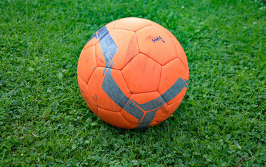 Fototapeta soccer ball on grass obraz