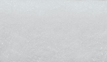 Shiny white snow on the whole background