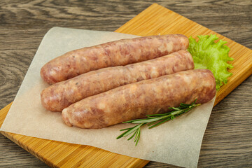 Raw pork meat sausages for grill