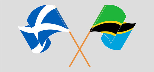 Crossed and waving flags of Scotland and Tanzania