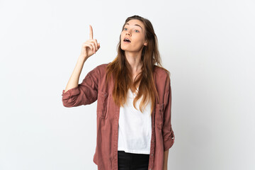 Young Ireland woman isolated on white background intending to realizes the solution while lifting a finger up