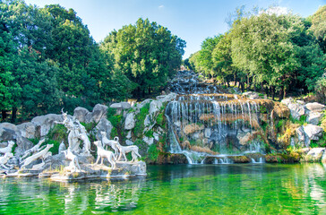 Fototapeta na wymiar Famous fountains and waterfalls of Reggia di Caserta, Royal Palace in summer season - Italy
