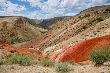Martian landscape in the mountains of the Altai Republic in Russia. The landscape is made of red...