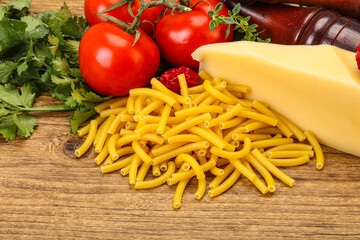 Italian pasta raw Maccheroni for cooking