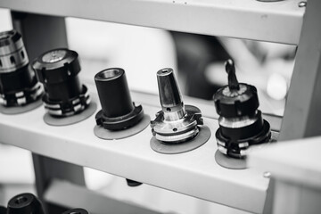 Set new drills and cutters for automatic metal processing machine, toning color