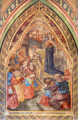 Fototapeta na wymiar VIENNA, AUSTIRA - JUNI 17, 2021: The fresco St. Dominic presented the Rosary in the Votivkirche church by brothers Carl and Franz Jobst (sc. half of 19. cent.).